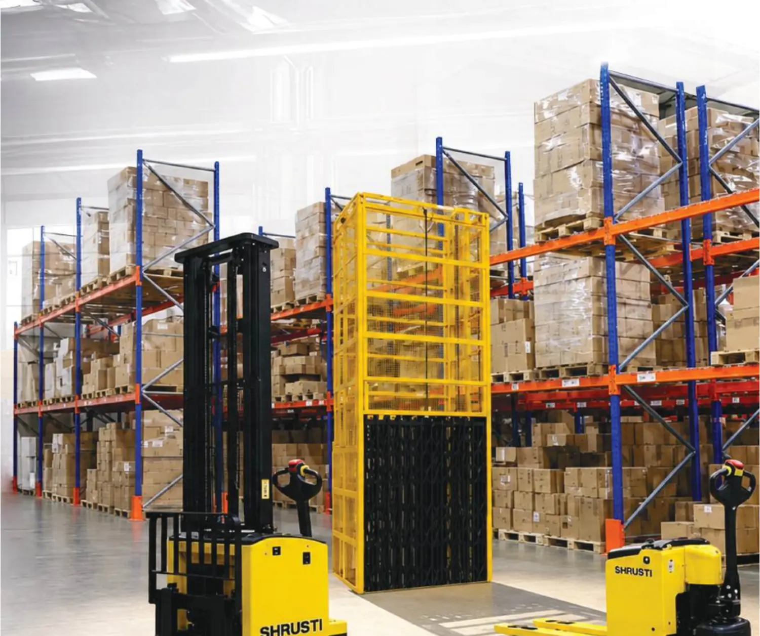 Shrusti material handling equipment operating within an industrial storage facility